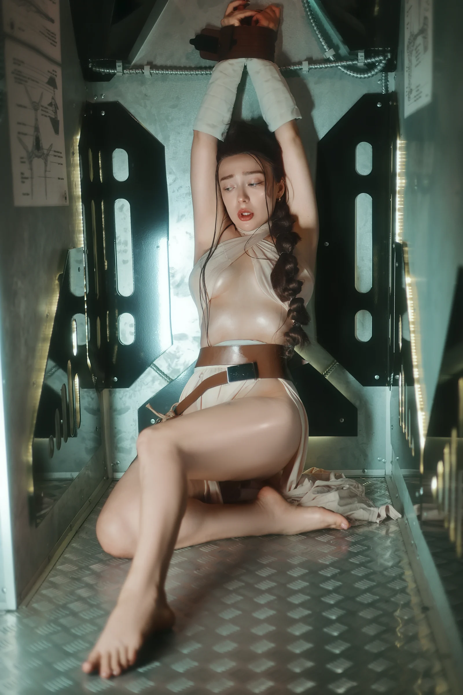 Ira in a science-fiction costume seated in a spacecraft interior